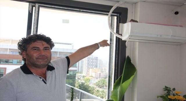 Mersin’de site yöneticisi, kumrunun üzerine yuva yaptığı klimasını kullanmıyor