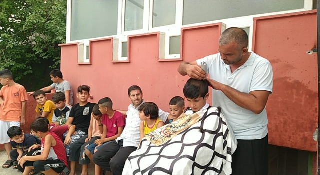Kozan’da yaz Kur’an kursu öğrencileri ücretsiz tıraş edildi