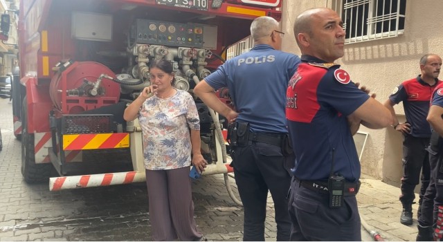 Akrabasının evinin yandığını gören kadın gözyaşlarına boğuldu