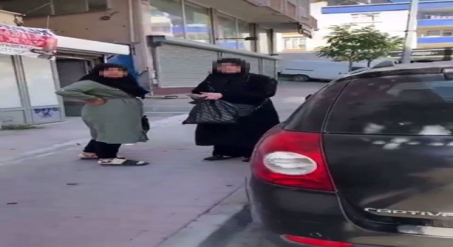 Pazarda kadının cüzdanını çalan şahısları böyle yakaladı