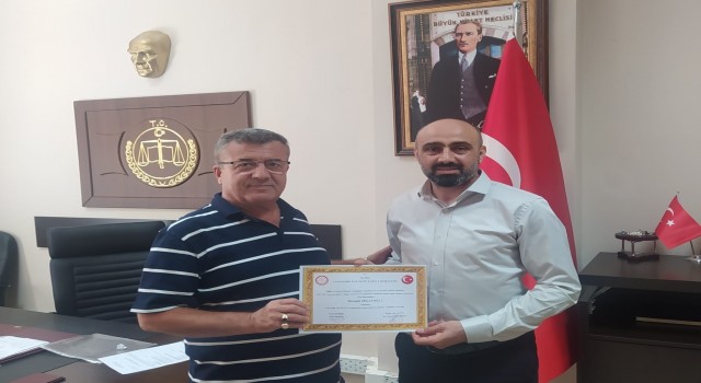 Yeniden seçilen Başkan Irgatoğlu mazbatasını aldı