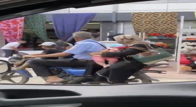 Bursada motosiklette ailecek yolculuk kameralarda