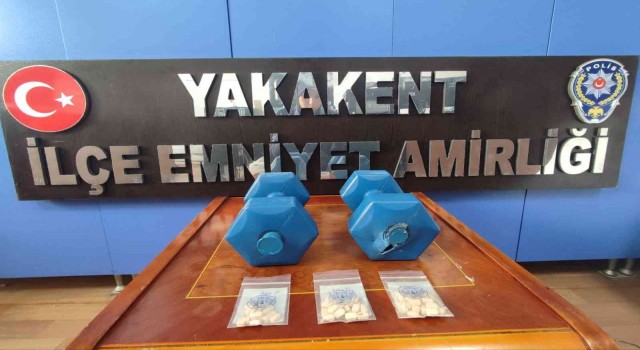 Dambılın içinde uyuşturucu hap ele geçirdi