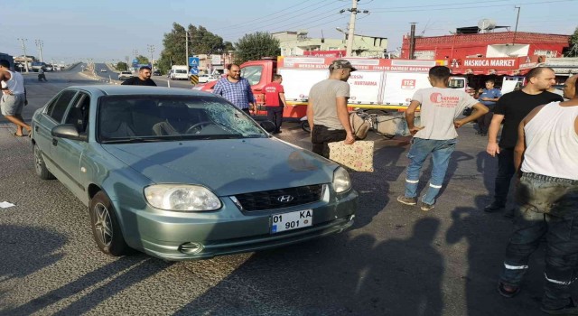 Tarsusta otomobille çarpışan motosikletli yaralandı