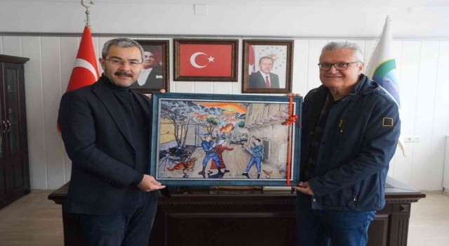 Cabar katliamını anlatan eserini Başkan Vurala takdim etti