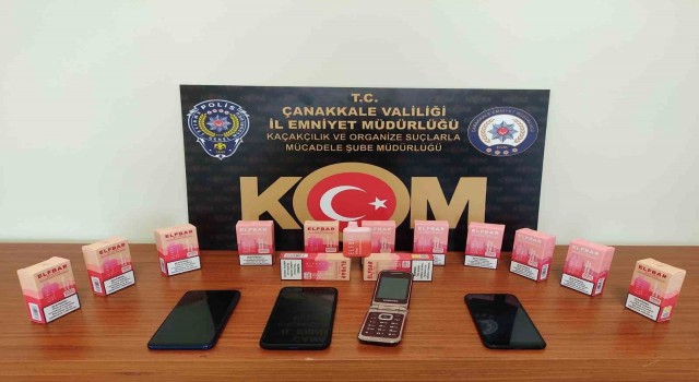 Ezinede klonlanmış cep telefonu ile gümrük kaçağı elektronik sigara ele geçirildi