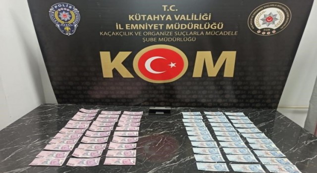 Kütahyada ormanlık alanda toprağa gömülü 9 bin 500 TL sahte para bulundu