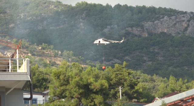 Alanyada ormanlık alanda çıkan yangın söndürüldü