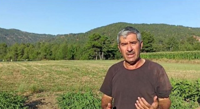 Zorunlu iniş yapan helikopterdeki yangın söndürme ekibini ayranla serinleten köylü kalpleri ısıttı