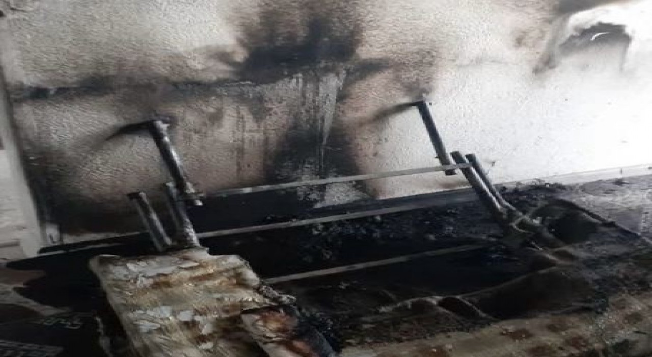 Sobadan çıkan yangın evde zarara neden oldu
