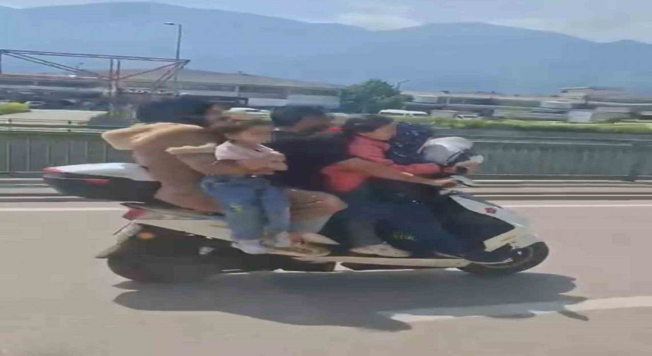 Bursada motosiklete 5 kişi binen aile yürekleri ağza getirdi