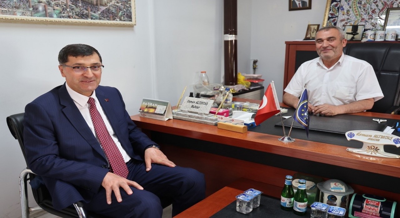 Başkan Eyüp Kahveciden hacdan dönen muhtarlara ziyaret