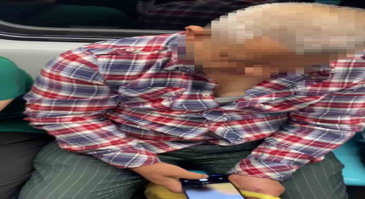 Metroda gizlice kadınların fotoğrafını çekti: Fark edilince telefonunu kırdı
