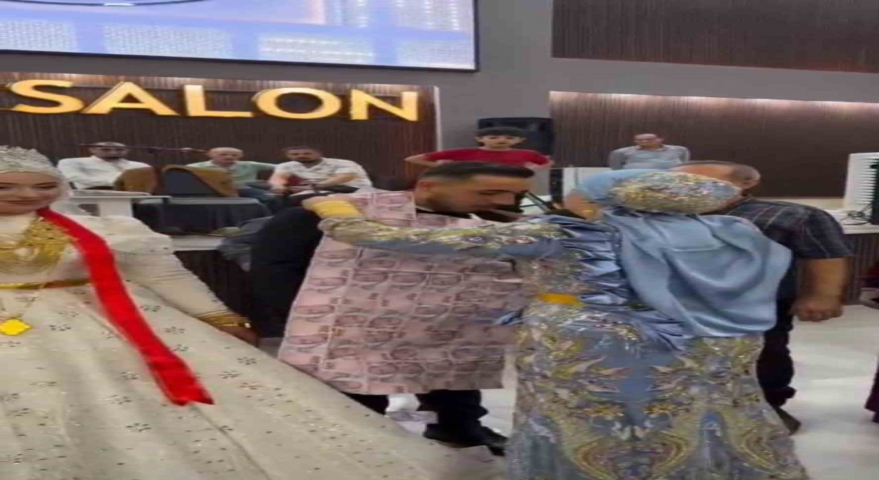 Mardinde damada 200 liralık banknotlardan oluşan yelek giydirildi