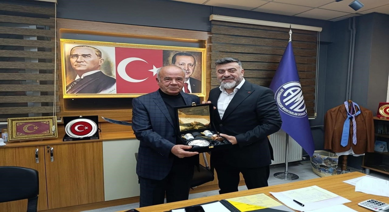 40 yıllık muhtara vefa plaketi