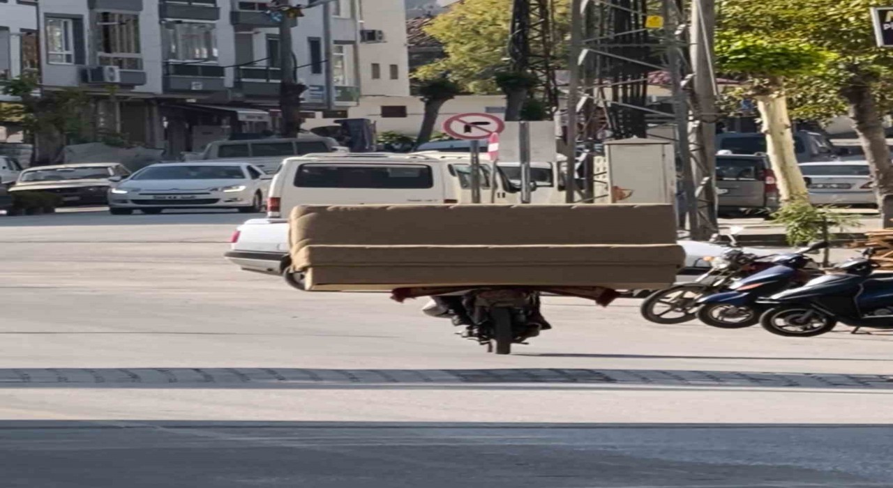 Erbaada motosikletle koltuk taşıdı