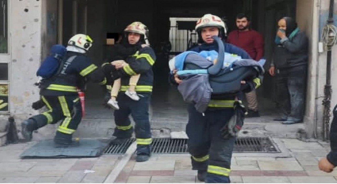 Ev olarak kullanılan iş hanında çıkan yangında 17si çocuk 21 kişi kurtarıldı