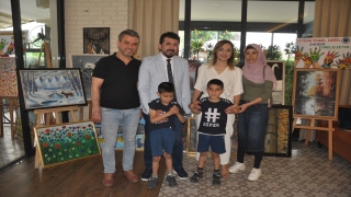 Mersin’de otizmli çocuklar yararına resim sergisi açıldı