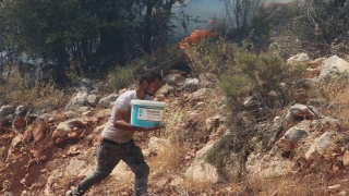 Antalya’da makilik alanda çıkan yangın kısmen kontrol altına alındı