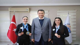 Doğan kardeşlerden Kaşa gurur madalyası