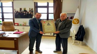 Simavlı hayırsevere Diyanet İşleri Başkanı Ali Erbaştan takdir belgesi