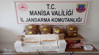 Pazar tezgahında bandrolsüz tütün ve makaron ele geçirildi