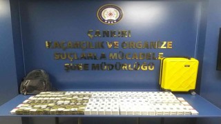 Polisin şüphelenerek durdurduğu şahsın valizinden onlarca paket kaçak sigara çıktı