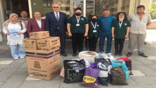 Salihlide öğrencilerden ihtiyaç sahiplerine kıyafet yardımı