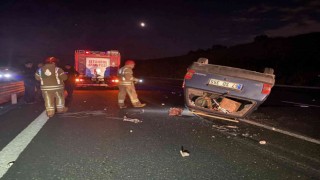 Kuzey Marmara Otoyolunda takla atan otomobil metrelerce sürüklendi: 2 yaralı