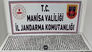 Salihlide 675 sikke ele geçirildi