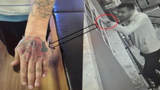 Elindeki dövme, hırsızı ele verdi