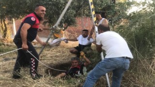 Germencikte kuyuya düşen kedinin imdadına itfaiye ekipleri yetişti