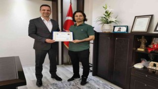 Kozan Kaymakamı Günçam, Gültekini ödüllendirdi