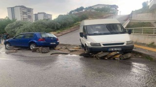 Selde kalan motosikletli çöken yolda aracın tekerine sıkıştı