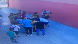 Boğazına madeni para kaçan öğrencinin imdadına okul müdürü yetişti