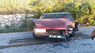 İş makinesi ile otomobil çarpıştı: 1 yaralı