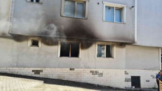 Kapıcı dairesinde çıkan yangında 2 kişi dumandan etkilendi