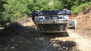 Ters dönen otomobilin sürücüsü yaralandı