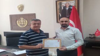Yeniden seçilen Başkan Irgatoğlu mazbatasını aldı