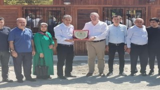 Muhtarlar Federasyonundan Başkan Turanlıya plaket
