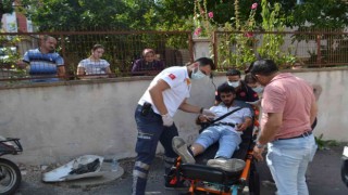 Otomobille çarpışan motosikletli kurye yaralandı