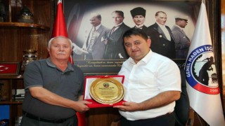 GMİSten Güner ve Ülpere plaket