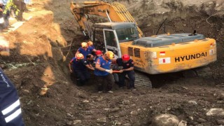 Define aramak için kazdıkları toprağın altında kalan gencin cesedine ulaşıldı