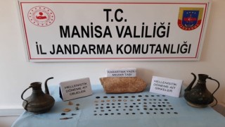 Manisada bir evde tarihi eserler ele geçirildi