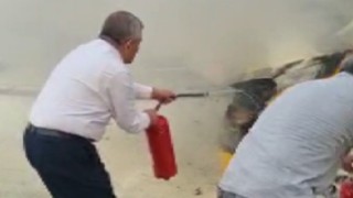 MHP İzmir İl Başkanı Şahinden yanan taksiye müdahale
