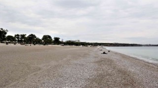 Milyonlarca turistin akın ettiği dünyaca ünlü sahilde yağmur sessizliği