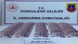 Piyasaya sahte para süren kalpazanlar yakalandı
