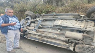 Yan yatan kamyonetten burnu bile kanamadan çıktı