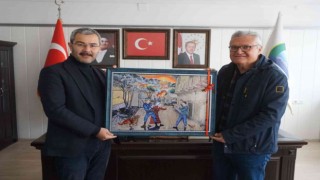 Cabar katliamını anlatan eserini Başkan Vurala takdim etti
