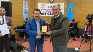 İHA Muhabiri Ahmet Arslantaşa plaket